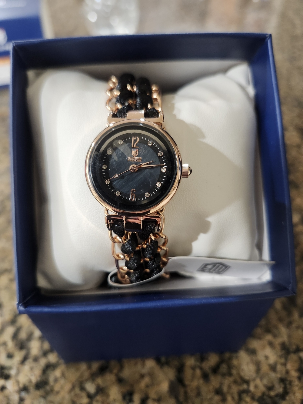 Montres Prestage By Invicta. Rose Gold and Black Braided Chain Bracelet Watch
